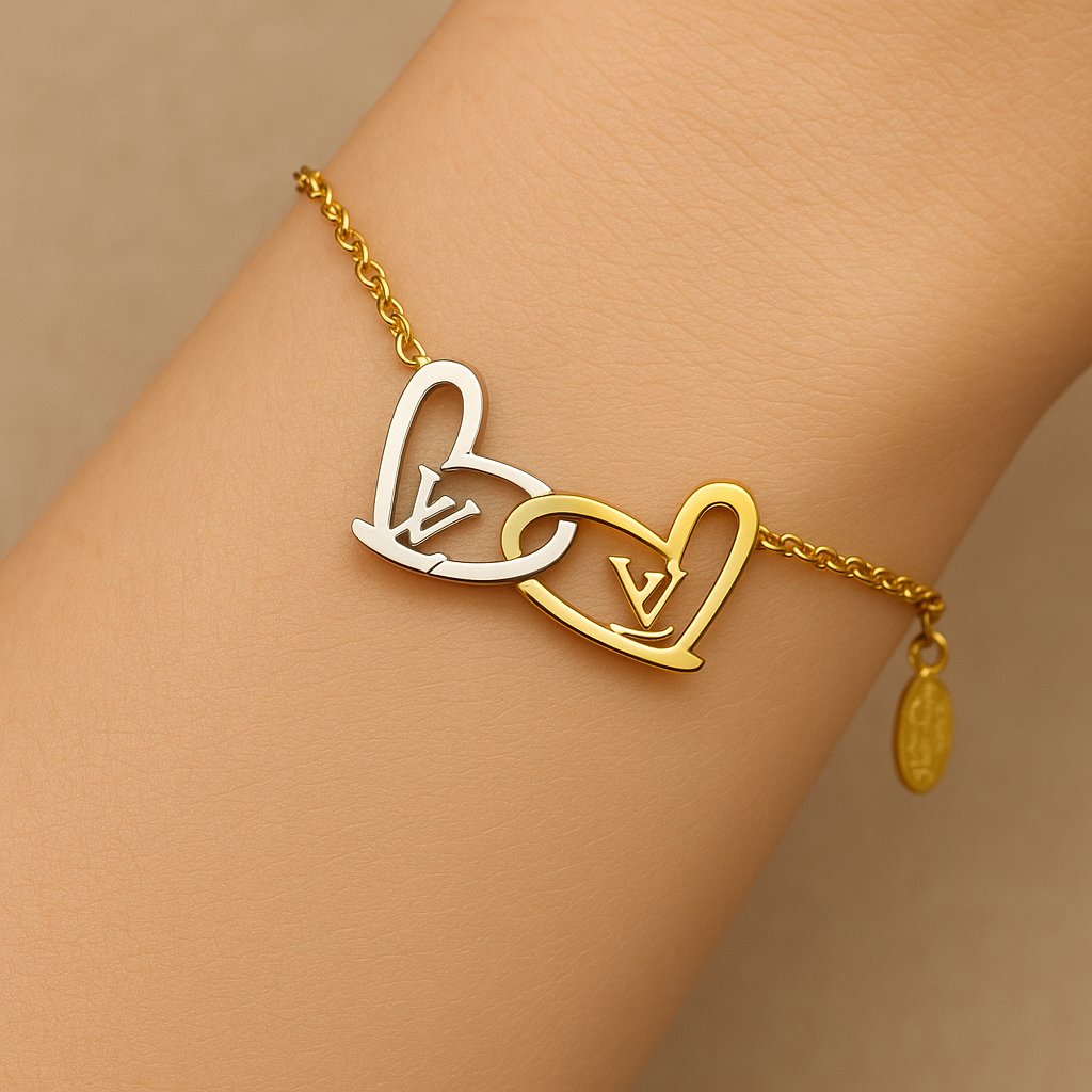 BAYAN ÇELİK KALP DETAYLI LV BİLEKLİK