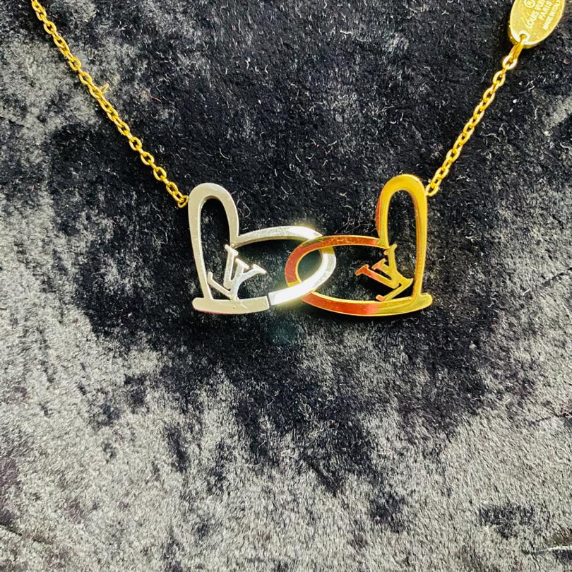 BAYAN ÇELİK KALP DETAYLI LV BİLEKLİK